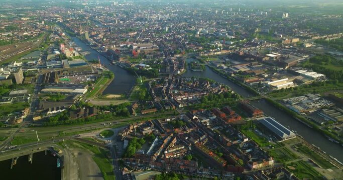 Aerial view of famous places Ghent, East Flanders province, Flemish Region of Belgium. The historic city center in the evening. Ghent aerial Cityscape. Gent Flanders Belgium on Sunny Day. Drone View