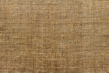 Natural linen fabric, background or texture, brown color, toned, top view, close up - 613541771