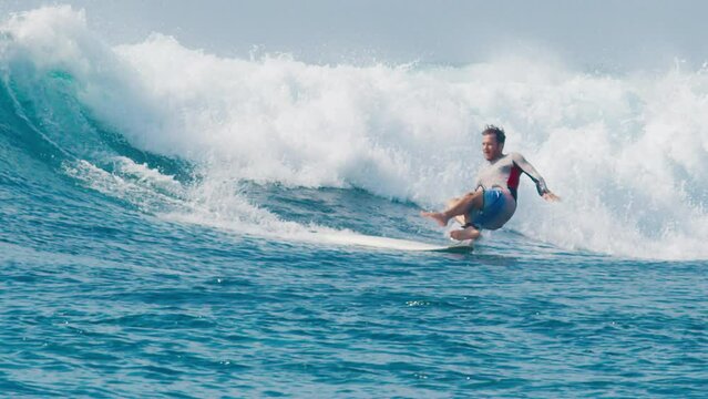 Surfers fall. Set of several short footages of different surfers falling into the water