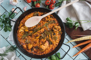 traditional moroccan dish with meat and vegetables in a hot pot, top view 