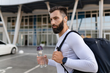 athletic strong hansome man on morning fitness workout exercise