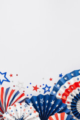 American Independence Day Party concept. Top view vertical flat lay of folding fans, star-shaped...