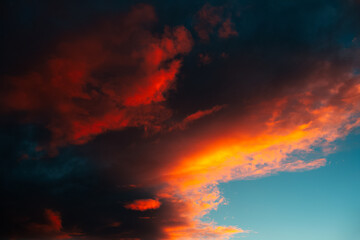 Fototapeta na wymiar Colorful sunset with dark clouds. Natural beautiful landscape of sky.
