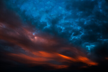 Fototapeta na wymiar Colorful sunset with dark clouds. Natural beautiful landscape of sky.