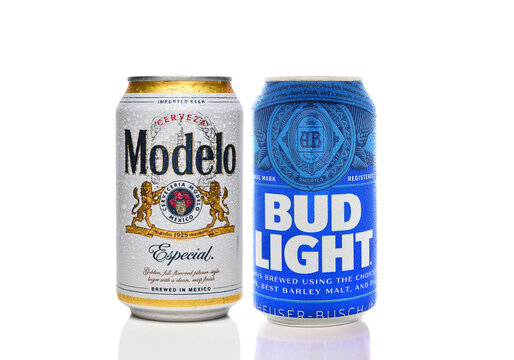 IRVINE, CALIFORNIA - 15 JUN 2023: A can of Modelo Especial and A can of Bud Light on white. The two brands battle for the Number 1 spot in USA Sales.