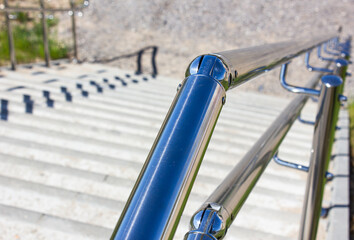 Handrail railing near the stairs. Metal handrails,balustrade,next to the stairs in an urban...