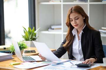 Successful happy smiling businesswoman saleswoman working on laptop computer, Young female making on video conference meeting online zoom, Accounting woman do taxes calculation interest rates law firm