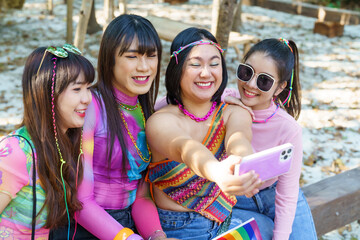 Happy friends LGBTQ transgender Asian woman taking selfie. .LGBTQIA  enjoying vacation best friends LGBT