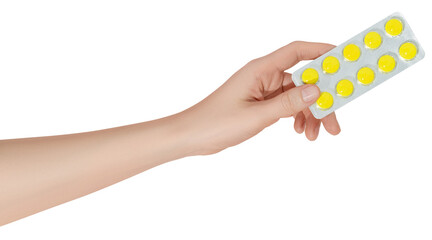 Hand holding pills in blister packs on a transparent background. Health care concept.