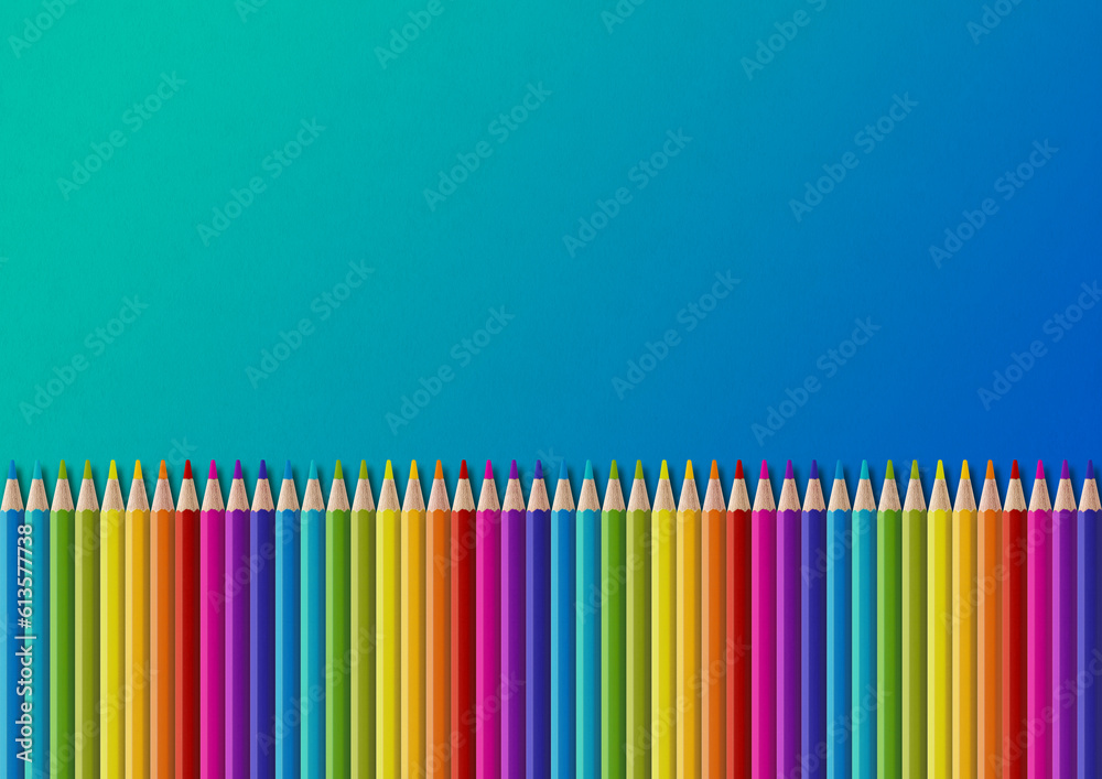 Poster Colored pencil group isolated on blue. Horizontal background