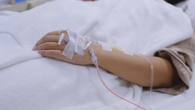A patient in the hospital with saline intravenous