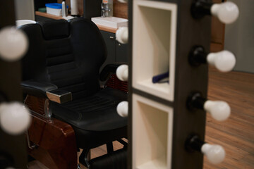 Leather chair in a barbershop with a minimalist interior