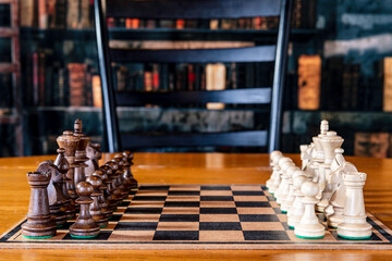 chess pieces on a chessboard in retro looking library