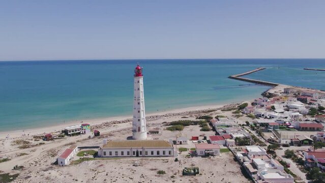 Aerial seascape view of Ilha do Farol (lighthouse island), in Algarve Tourism Destination Region, in Portugal south coast.