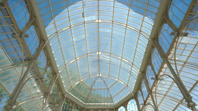 Glass roof of a glass palace or greenhouse, from the Retiro park, Madrid, Spain.