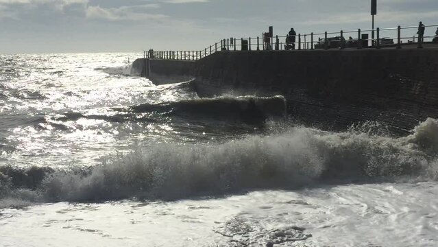 big waves coming in to Hastings old town at harbour arm 
