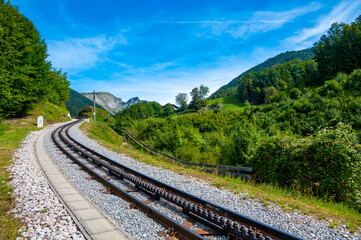 Fototapeta na wymiar View of Schafberg train and railways. SCHAFBERGBAHN Cog Railway running from St. Wolfgang up the Schafberg, Austria.