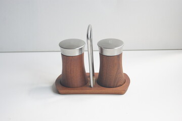 Salt and pepper set in teak wood.