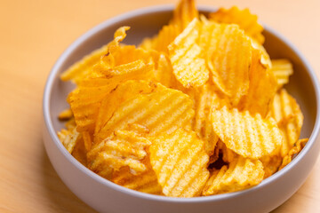 Potato chips crisps in bowl