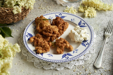 Black elder blossoms fried in a batter