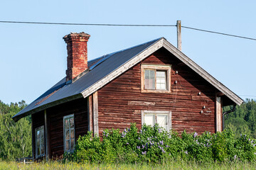 Old swedish house on a meadow