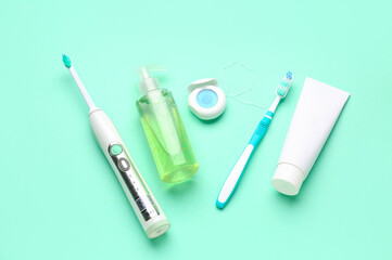 Set for oral hygiene on turquoise background