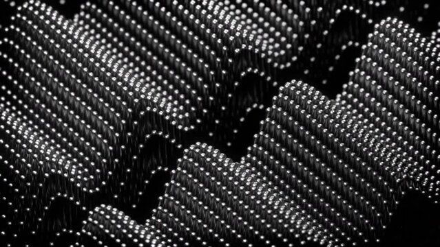 Abstract waves of metal cloud of tiny balls that fall down like rain. Design. Small falling metal particles.