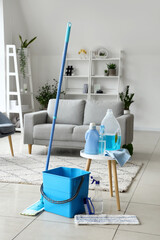 Table with cleaning supplies in living room