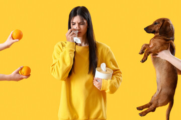 Allergic young woman sneezing and female hands with allergens on yellow background