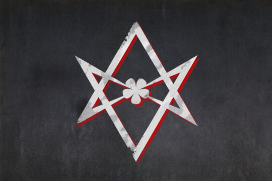 Unicursal Hexagram symbol drawn on a blackboard