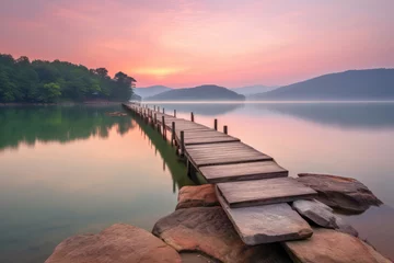 Foto op Canvas A serene sunset over a peaceful lake, with soft pastel colors and a sense of calmness, creating a soothing and contemplative mood © Matthias