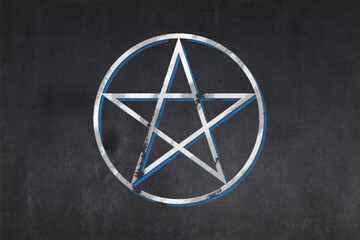 Pentacle symbol drawn on a blackboard