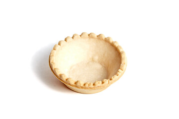 Empty tartlet shell isolated on white. Single crispy mini tart shell closeup