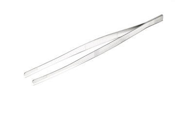 a pair of metal curved tweezers on a white background