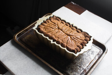 loaf cake in a silver baking pan, Loaf of lemon cake