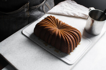 loaf cake on a white marble tray, Loaf of lemon cake