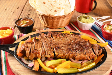 roasted meat with vegetables, barbecue with herb sauces, grilled steak