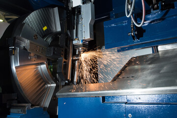 A plasma cutting machine cuts a metal product