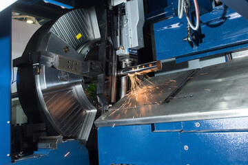 A plasma cutting machine cuts a metal product