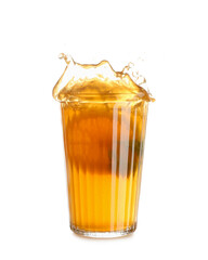 Glass of ice tea with splashes on white background