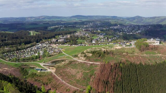 view of the sauerland and winterberg city in germany from above 4k 30fps video
