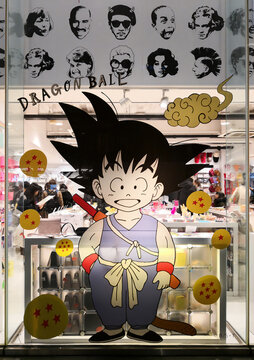 tokyo, japan - dec 15 2018: The Japanese anime and manga child character Son Goku depicted on a giant sticker on a show window of the Asoko shop of Harajuku during a collaboration with Dragon Ball.