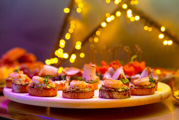 An appetizing plate of seafood bruschetta for a festive meal. Exquisite Seafood and Tapas Spread...