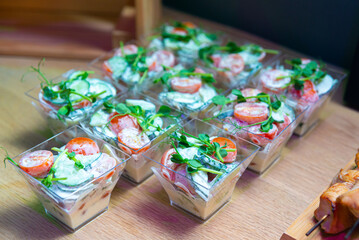 fresh cucumber, cherry tomatoes salad in a yoghurt dressing