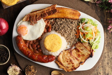 beans with powdered meat and rice, arepa and grilled meat