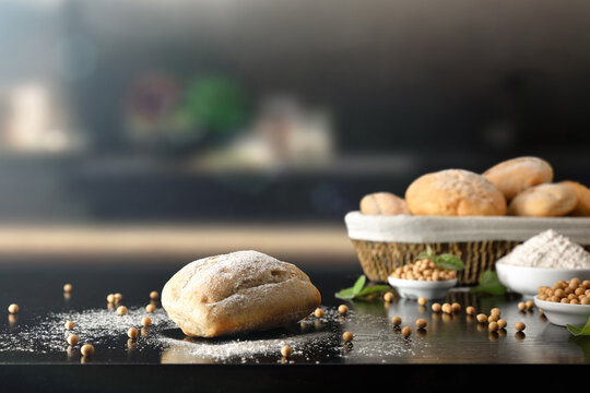 Soy Flour Bread And Grains On Black Kitchen Bench