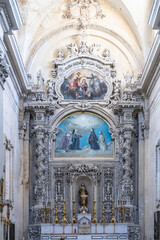 Obraz premium Four of the most beautiful churches in Lecce: Cathedral, Santa Croce, San Matteo, Santa Chiara. Details, frescoes, twisted columns and statues. Decorations of Lecce Baroque. View of cathedral crypt.