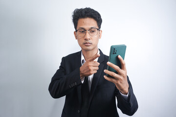 Anger mobile phone mad emotion expressing partner internet people person concept. Portrait of disappointed mad confused with open mouth financier with phone in hand isolated on white