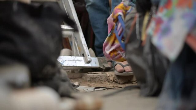 detail of a foot walking in the room of a person with hoarding disorder