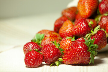 Big juicy strawberries on a napkin. Closeup with copy space.